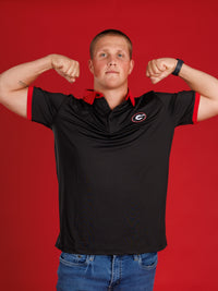 Solid Black With Red Collar And Oval G Polo